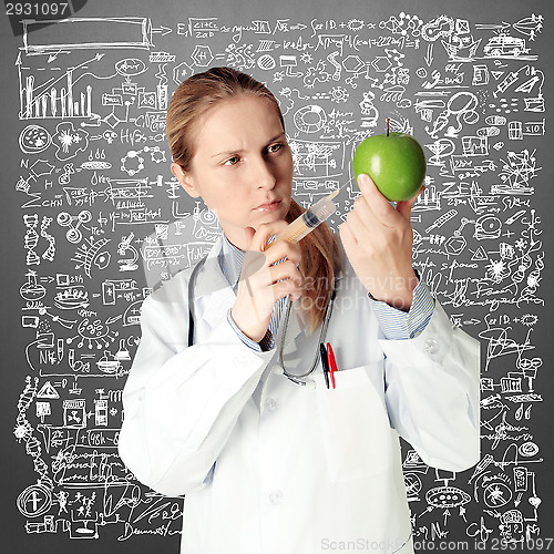 Image of scientist woman with apple