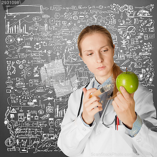 Image of scientist woman with apple