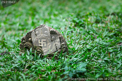Image of Tombstone with the image of ancient symbol - the swastika