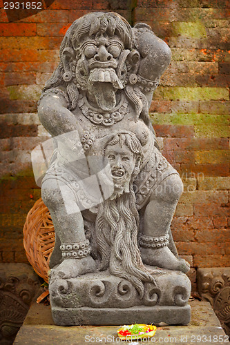 Image of Vintage statue of the deity child-eating Rangda. Indonesia, Bali