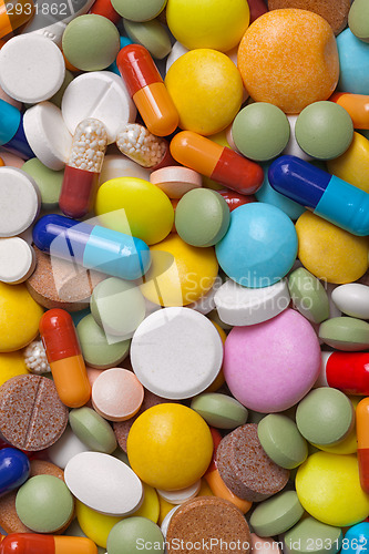 Image of Pile of colorful medications tablets - medical background
