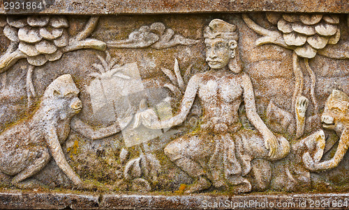Image of Old bas-relief on the wall of the temple. Indonesia, Bali