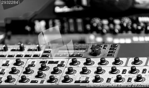 Image of Closeup photo of an audio mixer