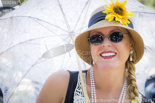 Image of Attractive Woman in Twenties Outfit Holding Parasol