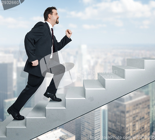 Image of business man and stairs