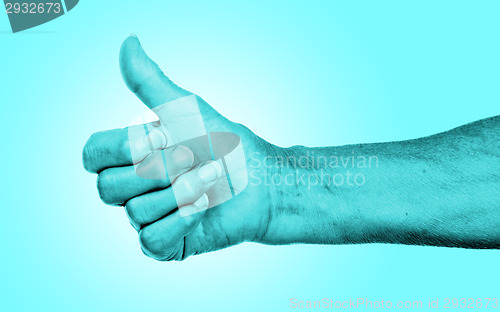 Image of Old woman with arthritis giving the thumbs up sign