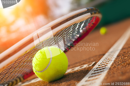 Image of tennis ball on a tennis court