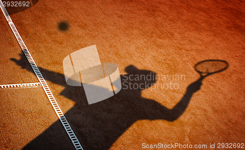 Image of 	Clay tennis court and player concept