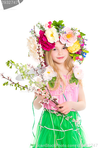 Image of Llittle girl with flowering branches