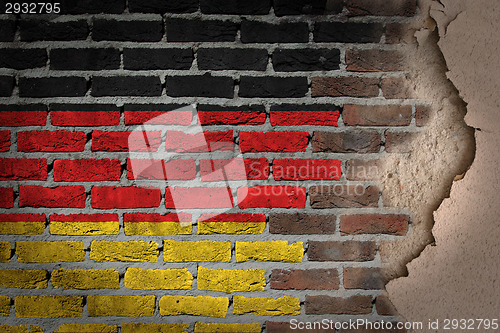Image of Dark brick wall with plaster - Germany