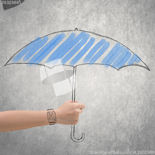 Image of concept of waterproof by holding a umbrella