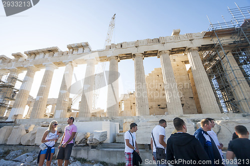 Image of People sightseeing Parthenon temple in Greece