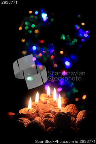 Image of christmas candles in the dark night