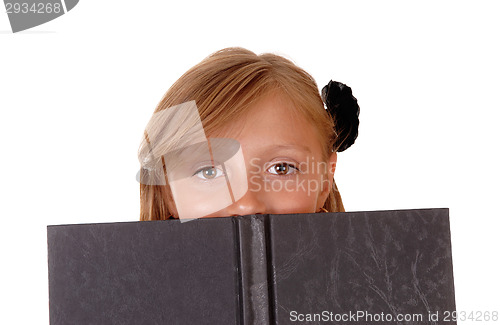 Image of Girl reading book.