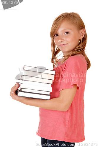 Image of Little girl caring books.