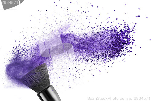 Image of makeup brush with blue powder isolated