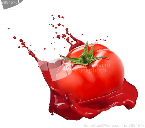 Image of Red tomato with juice splash isolated on white