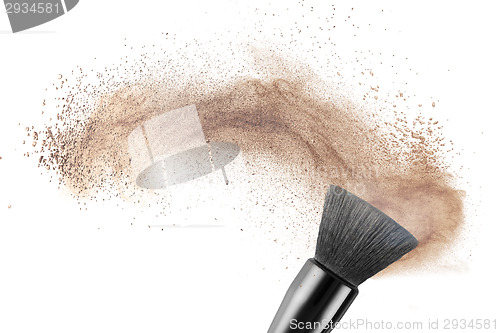 Image of makeup brush with powder foundation isolated