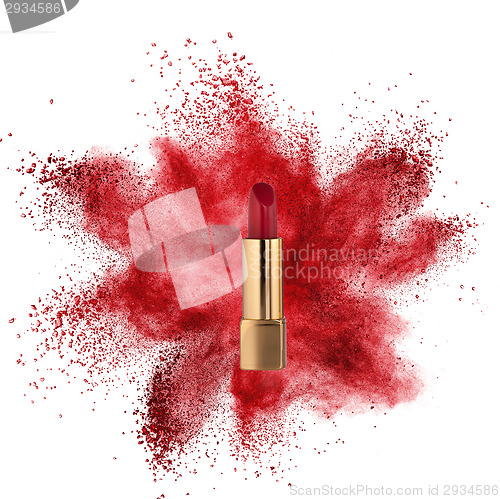 Image of Red lipstick with powder explosion isolated on white