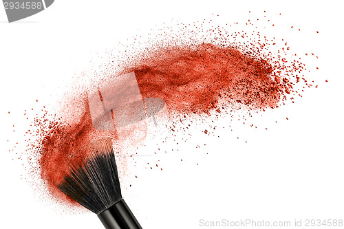 Image of makeup brush with red powder isolated