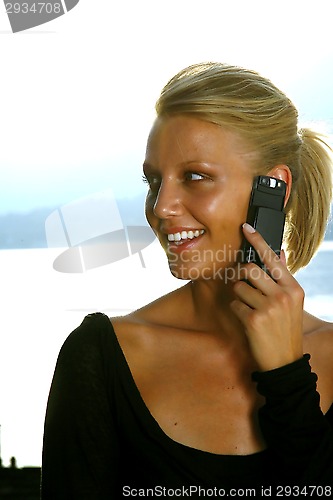 Image of woman talking on cell phone