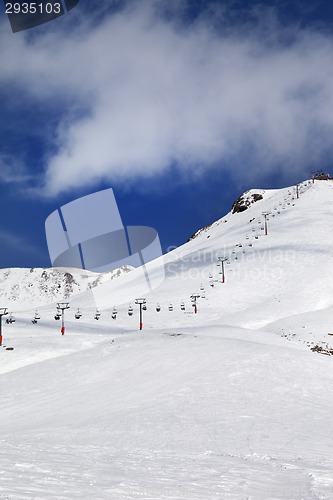 Image of Chair-lift and ski slope