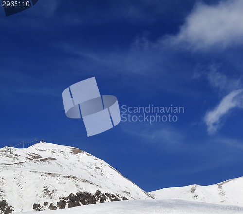 Image of Ski resort at sun winter day