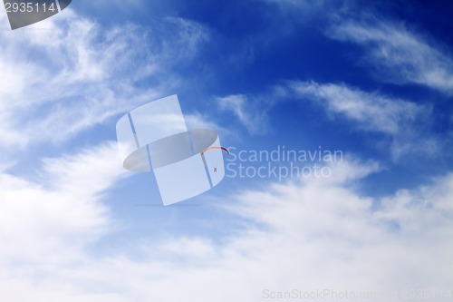 Image of Silhouette of skydiver at sky