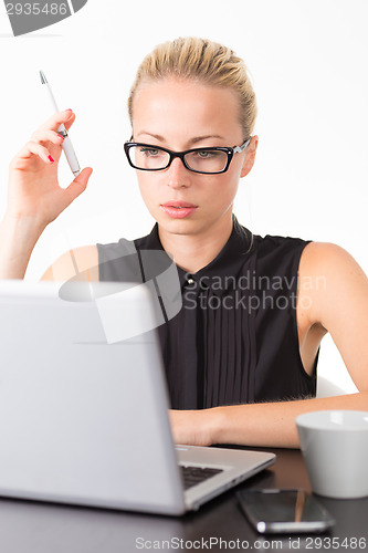 Image of Business woman in office.