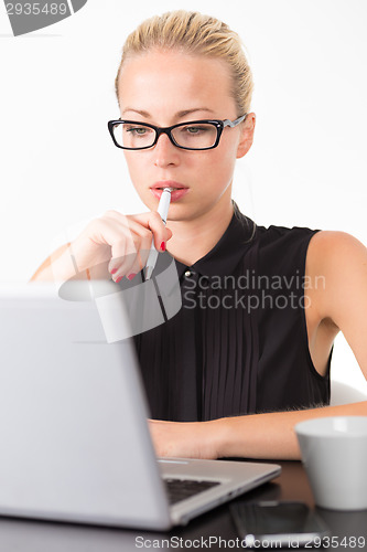 Image of Business woman in office.