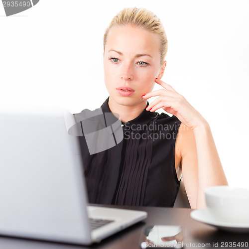 Image of Business woman in office.