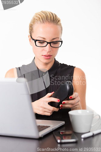 Image of Business woman in office.
