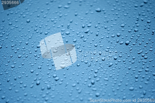 Image of Natural water drops on glass