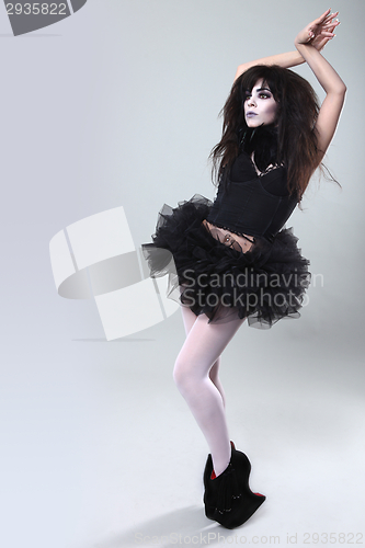 Image of Gothic Expressive Girl on Plain Background