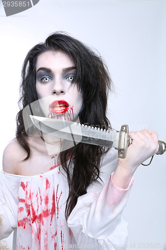 Image of Psychotic Bleeding Woman in a Horror Themed Image