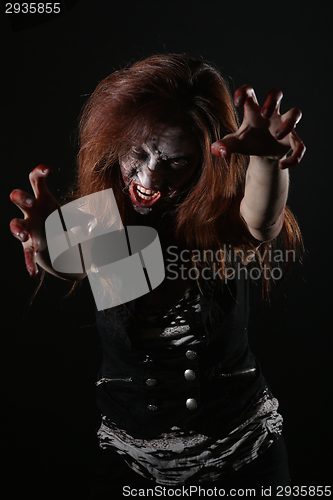 Image of Psychotic Bleeding Woman in a Horror Themed Image