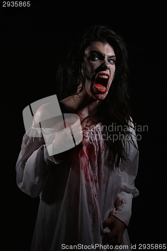 Image of Psychotic Bleeding Woman in a Horror Themed Image