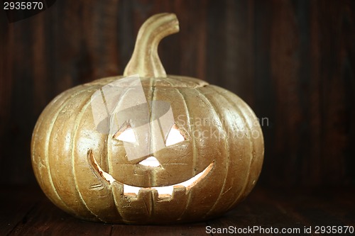 Image of Halloween Pumpkin on Wood Grunge Rustic Background