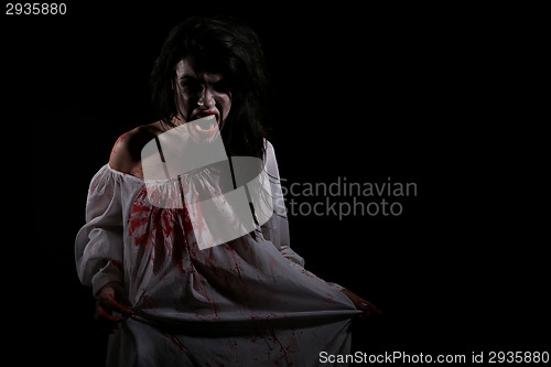 Image of Psychotic Bleeding Woman in a Horror Themed Image