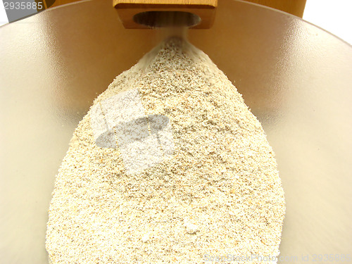 Image of Looking at a flour mill doing its work
