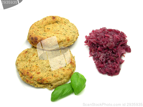 Image of Round flat potato dough cakes with basil and red cabbage