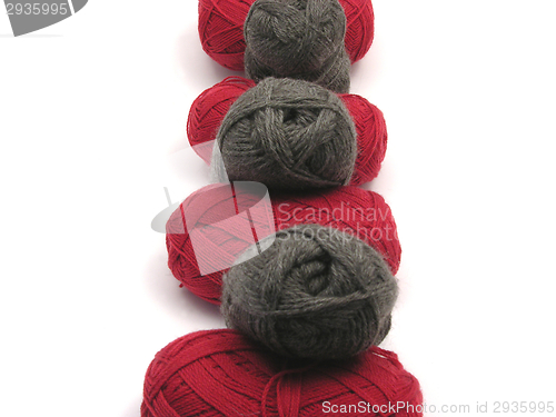 Image of Gray and red new wool as midline on white background