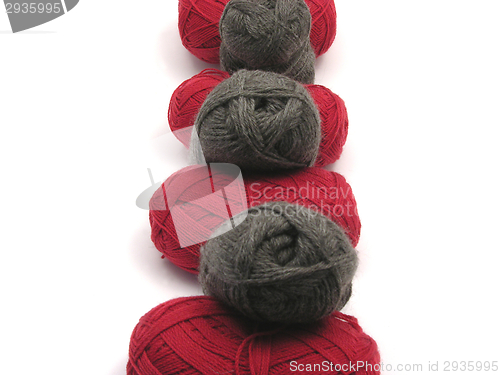 Image of Gray and red new wool as midline on white background