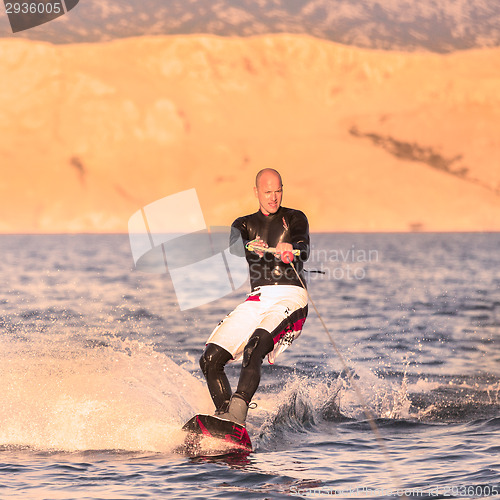 Image of Wakeboarder in sunset.