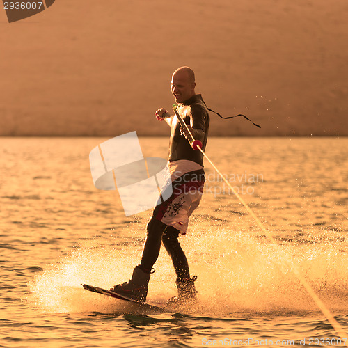 Image of Wakeboarder in sunset.