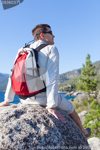 Image of young man hiking
