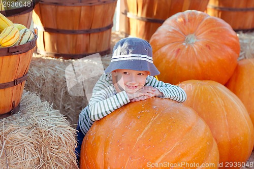 Image of kid at pumpkin patch