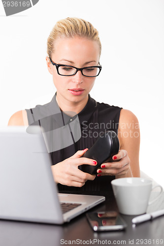 Image of Business woman in office.