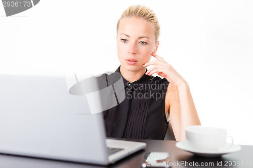 Image of Business woman with cup of coffee.