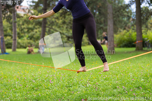 Image of Slack line in the city park.